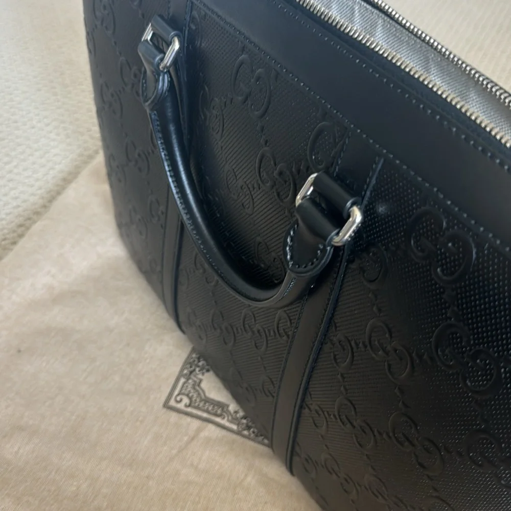 New-Gucci leather bag. Can be used for work or travel. fit laptop & work files.
